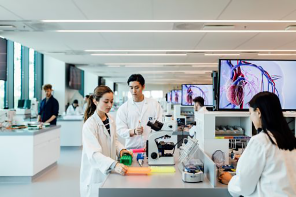 two people in lab coats